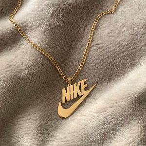 2 Nike Swoosh Necklaces
